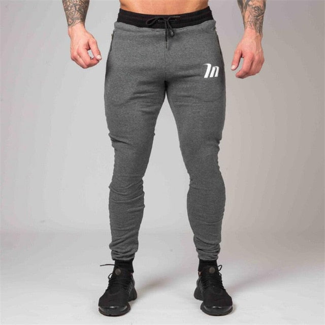 NANSHA Sportswear Gyms Pants Mens Tracksuit Casual Pant Male Fitness Workout Pants Sweatpants Trousers Jogger Pants